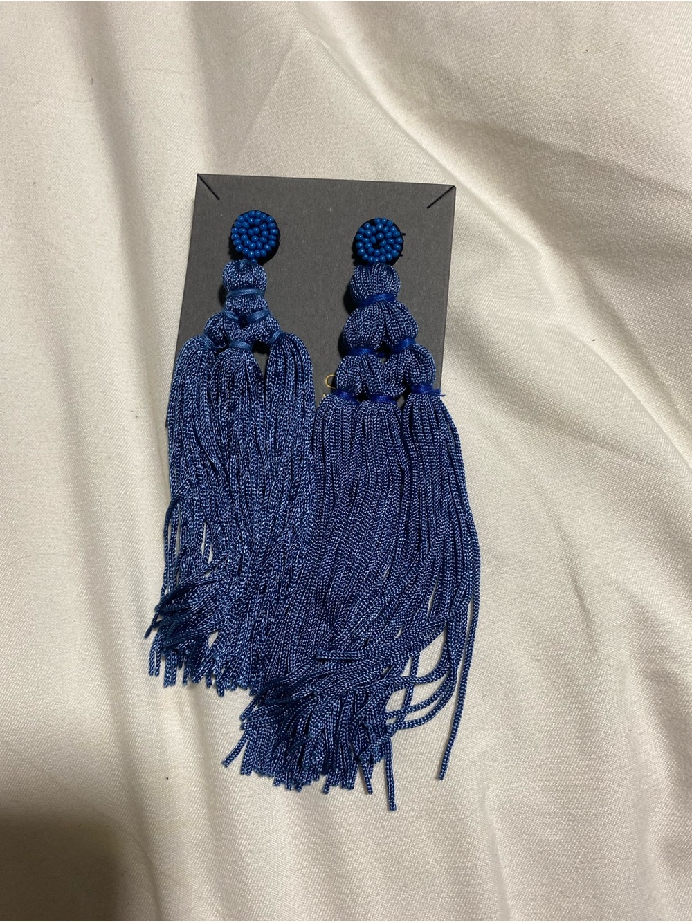 SHASHI Navy Beaded Multi-Tier Tassel Earrings